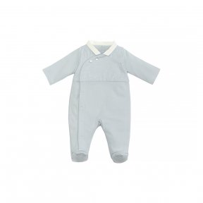 Laranjinha blue cotton jersey babygrow with star detail to the bib and feet . It crosses over and fastens at the front with hidden poppers. Decorative mother-of-pearl buttons AW18 18446
