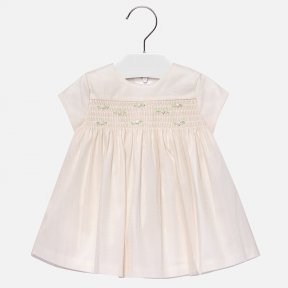 Mayoral baby girls  smocked dress . In ivory tulle with fine glittery sparkles over a lightweight  lining, the bodice is smocked and decorated with pink ribbon rosebuds. A/W18 2932