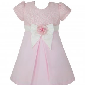 Pretty Originals 2 piece shorts set. Pale pink, fully line, shorts with a sparkling silver flower pattern through the materials. Large pink bow belt detail with an elasticated waist. Cream, long-sleeved blouse with pleat and ruffle details finished with p