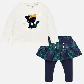 Cute navy and green tartan skirt set. The frilled tartan skirt has sewn in navy leggings and an elasticated and adjustable waist. The matching cream top is embellished with a tartan cat motif and sparkly gold stars.