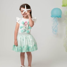 Caramelo Kids,  white cotton top, short sleeves, shoulder frills, a mermaid print,  tulle flowers, pearls, diamanté detail, mint green skirt, shell design, glittery silver elasticated waist,  tulle lining. 012284  