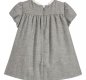 Mayoral baby girls short sleeved grey dress with a white ruffled round neck collar and zip fastening to the back. The dress is made from soft fabric with a cotton lining and has frilled detailing with smocking and an applique red bow. A/W18 2914