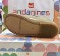 Andanines camel patent leather girls shoes. Scallop edged with a silver buckle fastening. Soft leather insole and lining.